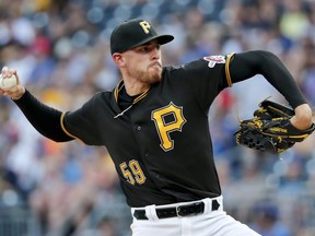 Pittsburgh Pirates starter Joe Musgrove pitches to a Chicago Cubs batter during the first inning of a baseball game, Saturday, Aug. 18, 2018, in Pittsburgh.