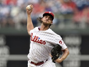 Philadelphia Phillies starting pitcher Aaron Nola throws during the first inning of a baseball game against the New York Mets, Friday, Aug. 17, 2018, in Philadelphia.