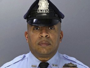 This undated photo provided by the Philadelphia Police Department shows police officer Jaison Potts, who was shot in the face Monday, Aug. 6, 2018, while helping fellow SWAT officers serve a warrant at a house in Philadelphia. A man who authorities say shot at the officers was critically wounded in the shootout early Monday. A woman at the home was also wounded. Officials say the person named in the warrant was not in the residence and remains at large.