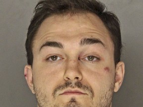 This undated photo provided by the Allegheny County District Attorney's Office shows Joden Rocco, charged with homicide in connection with the fatal stabbing of Dulane Cameron Jr. early Sunday, Aug. 19, 2018, outside a bar in Pittsburgh. Activists are calling for the fatal stabbing of Cameron, a 24-year-old black man, to be investigated as a hate crime after an Instagram video emerged of Rocco saying he was trying to see how many times he could use a racial epithet before being thrown out of bars.