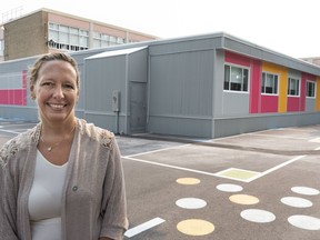 Marie-Jose Mastromonaco, vice-president of the Montreal School Board, is seen next to temporary classrooms at the Saint-Gabriel-Lalemant in Montreal on Friday, August 24, 2018.