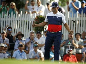 Gary Woodland reacts to a birdie on the 16th hole during the first round of the PGA Championship on Thursday at Bellerive Country Club in St. Louis.