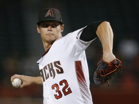 Arizona Diamondbacks starter Clay Buchholz throws a pitch to a  Los Angeles Angels batter during the first inning of a baseball game Wednesday, Aug. 22, 2018, in Phoenix.