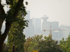 Downtown Vancouver as seen through the haze from East Vancouver on Aug. 13, 2018.