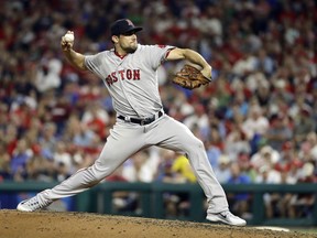 Boston Red Sox's Nathan Eovaldi pitches during the third inning of the team's baseball game against the Philadelphia Phillies, Wednesday, Aug. 15, 2018, in Philadelphia.