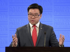 In this July 7, 2015, photo, Race Discrimination Commissioner Tim Soutphommasane delivers his address to the National Press Club in Canberra, Australia. Soutphommasane said on Monday, Aug. 6, 2018, the country is experiencing a resurgence in lawmakers exploiting race to advance their political agendas and listed ethnic Chinese and Sudanese among the minorities who are suffering.