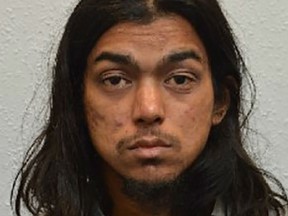An undated handout picture released by the British Metropolitan Police Service in London on August 31, 2018, shows Naa'imur Zakariyah Rahman, 21, who planned to bomb the gates of no 10 Downing Street office, kill guards and then attack Britain's Prime Minister Theresa May.