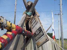 A sign marks the entrance to Mi'kmaq encampment near the Shubenacadie River, a 72-kilometre tidal river that cuts through the middle of Nova Scotia and flows into the Bay of Fundy, in Fort Ellis, N.S. on Tuesday, July 31, 2018.