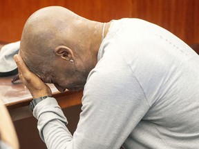 Plaintiff Dewayne Johnson reacts after hearing the verdict in his case against Monsanto at the Superior Court of California in San Francisco on Friday, Aug. 10, 2018.