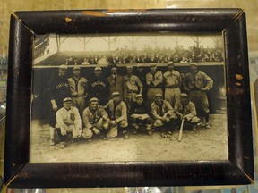 This image provided by Saco River Auctions in Biddeford, Maine, shows a photograph that belonged to baseball great Harry Lord. The 1910 photograph shows a group of American League all-stars, including Ty Cobb, front row, far left, prior to a game at Shibe Park in Philadelphia. It will sold sold at an upcoming auction in Biddeford. (Courtesy of Saco River Auctions via AP)
