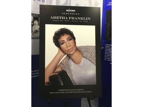 A poster honoring the late Aretha Franklin is displayed at the Motown Museum Wednesday, Aug. 22, 2018, in Detroit. The legendary singer died Aug. 16, 2018, in her hometown of Detroit. The private funeral Aug. 31 will be held at Detroit's Greater Grace Temple and caps several days of high-profile events memorials.