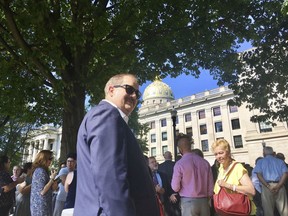 Former coal executive Don Blankenship waits outside the West Virginia Capitol on Wednesday, Aug. 29, 2018, after the Capitol was evacuated due to a fire alarm in Charleston, W.Va. The alarm interrupted a hearing for Blankenship in the state Supreme Court over whether he could be placed on the fall ballot in the U.S. Senate race.