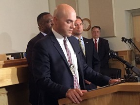 Frederick Police Department Sgt. Ian Albert speaks to reporters on Thursday, August 16, 2018 at a news conference on the arrest of Chris Watts in connection with the disappearance of his pregnant wife and their two young children.  Watt's pregnant wife, 34-year-old Shanann Watts, and their two daughters, 4-year-old Bella and 3-year-old Celeste were reported missing Monday.