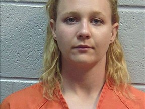 FILE - This June 2017 file photo released by the Lincoln County, Ga., Sheriff's Office, shows Reality Winner. Winner, of Georgia, who mailed a secret U.S. report to a news organization faces the "longest sentence" ever behind bars for a federal crime involving leaks to the news media, prosecutors said in a court filing. Former National Security Agency contractor Winner, 26, is scheduled to be sentenced Aug. 23, 2018, by a U.S. District Court judge in Augusta. (Lincoln County Sheriff's Office via AP, File)