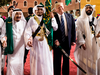 U.S. President Donald Trump and Saudi Arabia’s King Salman bin Abdulaziz al-Saud, left, join a sword dance at the Murabba Palace in Riyadh, May 20, 2017.