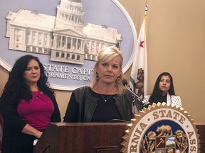 FILE - In this May 9, 2018 file photo former Fox News anchor Gretchen Carlson speaks in support of a California bill aimed at protecting workers from forced arbitration and nondisclosure agreements during a news conference in Sacramento, Calif. The state Senate approved the bill, by Assemblywoman Lorena Gonzalez Fletcher, D-San Diego, left, and sent it to Gov. Jerry Brown, Wednesday, Aug. 22, 2018.