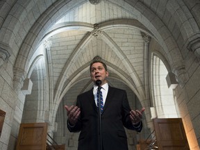Conservative Leader Andrew Scheer speaks to reporters following a caucus meeting on Parliament Hill in Ottawa on Wednesday, May 23, 2018.