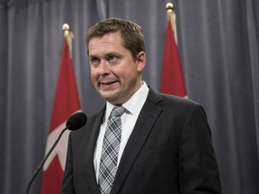 Conservative leader Andrew Scheer speaks to reporters at the Party's national convention in Halifax on Thursday, August 23, 2018.  Conservative Leader Andrew Scheer defended his party’s suddenly sharp criticism of the Liberal government’s performance on the North American Free Trade Agreement, saying the Tories want a deal with the United States as much as anyone.
