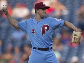 Scott Kingery of the Philadelphia Phillies throws a pitch in the top of the eighth inning in a game against the New York Mets on Aug. 16, 2018, in Philadelphia.