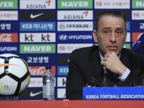 South Korea's new national football team coach Paulo Bento speaks during a press conference in Goyang, South Korea, Thursday, Aug. 23, 2018. Bento wants to bring the Asian Cup back to Seoul for the first time since 1960.