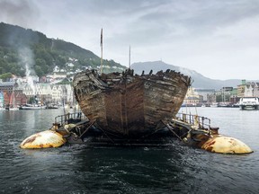 picture taken on August 6, 2018 shows the ship used by Norwegian polar explorer Roald Amundsen upon its arrival at the port of Bergen in western Norway after completing its journey around the North Pole 100 years after her chaotic expedition started. A precious relic of Norwegian polar expeditions, the Maud was recovered in 2016 after spending 85 years in Canadian Arctic waters where it sank in 1930. It was towed across the North Atlantic on a barge after it left Greenland at the end of June.
