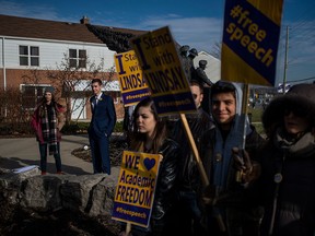 Wilfrid Laurier University students rally in support of free speech and teaching assistant Lindsay Shepherd, seen at left, in Waterloo, Ont., on Nov. 24, 2017.