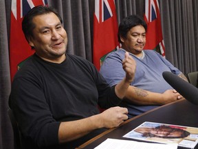 Norman Barkman (left) and Luke Monias (right) speak at a press conference at the Manitoba Legislature Friday, November 13, 2015. The federal government has reached a financial settlement with two of four Indigenous men from northern Manitoba who were switched at birth and only found out about the mixup 40 years later.