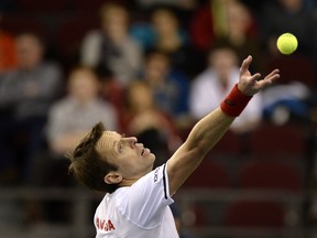 In this Feb. 4, 2017 file photo, Canada's Daniel Nestor serves against Great Britain at the Davis Cup in Ottawa.