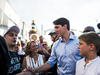 Prime Minister Justin Trudeau greets people on Toronto’s Danforth Avenue in Toronto, Aug. 10, 2018.