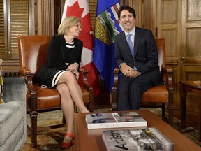 Prime Minister Justin Trudeau and Alberta Premier Rachel Notley speak during a meeting on Parliament Hill, Tuesday, Nov. 29, 2016 in Ottawa.