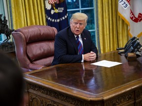 U.S. President Donald Trump speaks following a phone conversation with Enrique Pena Nieto, Mexico's president, not pictured, in the Oval Office of the White House in Washington, D.C., U.S., on Monday, Aug. 27, 2018.