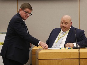 Lead prosecutor Michael Snipes questions physical evidence Detective Garrick Whaley, with the Dallas County Sheriff's Department, during the fifth day of the trial of fired Balch Springs police officer Roy Oliver, at the Frank Crowley Courts Building in Dallas on Wednesday, Aug. 22, 2018. Oliver is charged with the murder of 15-year-old Jordan Edwards.