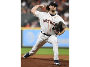 Houston Astros starting pitcher Gerrit Cole delivers during the first inning of the team's baseball game against the Oakland Athletics, Monday, Aug. 27, 2018, in Houston.
