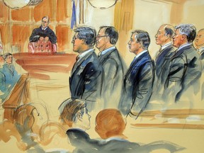This courtroom sketch depicts Paul Manafort, fourth from right, standing with his lawyers in front of U.S. district Judge T.S. Ellis III, center rear, and the selected jury, seated left, during the jury selection of his trial at the Alexandria Federal Courthouse in Alexandria, Va., Tuesday, July 31, 2018. A jury set to decide the fate of President Donald Trump's former campaign chairman Manafort was selected Tuesday, and opening statements in his tax evasion and bank fraud trial were expected in the afternoon.