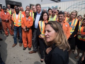 Minister of Foreign Affairs Chrystia Freeland addresses workers after touring Tree Island Steel, in Richmond, B.C., on Friday, August 24, 2018.