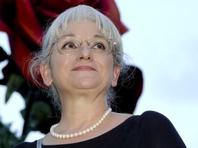 The new general manager and artistic director of the Verona Arena, Cecilia Gasdia, 57, talks during an interview with the Associated Press ahead of the season premiere of Rossini's ''Barbiere di Siviglia'' at the Verona Arena, in Verona, Northern Italy, Saturday, Aug. 4, 2018. After the colossal Roman-era Verona Arena amphitheater lost audience and prestige, nearly closing two seasons ago under a mountain of debt, artists and public that have sustained it are putting hopes for a relaunch Cecilia Gasdia, in her first season as general manager