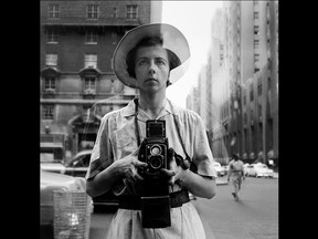 Vivian Maier, seen in an undated self-portrait, worked as a nanny and took photographs during her time off. She died a penniless unknown but gained posthumous fame following discovery of her work.