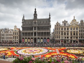 The Brussels Flower Carpet, laid out in its entirety, on the Grand Place in Brussels, Thursday, Aug. 16, 2018. More than 500,000 flowers were used to create the Latin American theme, devoted to the Mexican region of Guanajuato which has an exceptionally rich culture and flower tradition.