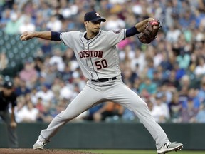 Houston Astros starting pitcher Charlie Morton throws against the Seattle Mariners in the first inning of a baseball game Tuesday, July 31, 2018, in Seattle.