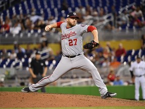 Shawn Kelley pitches against Miami on July 26, 2018.