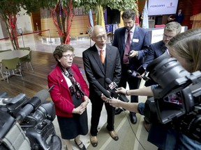 UW-Madison Chancellor Rebecca Blank and Louis Woo, Special Assistant to CEO of Foxconn hold a press conference after the event. Foxconn Technology Group announced Monday, Aug. 27, 2018, that it will invest $100 million in engineering and innovation research at the University of Wisconsin-Madison, making it one of the largest gifts in the school's history that comes as the Taiwan-based electronics giant builds a factory in southeastern Wisconsin that would be the company's first of its kind in North America.