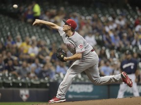 Cincinnati Reds starting pitcher Homer Bailey throws during the first inning of a baseball game against the Milwaukee Brewers Monday, Aug. 20, 2018, in Milwaukee.