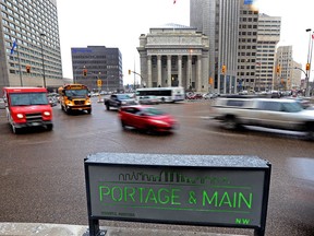 Traffic crosses Main Street at Portage Avenue in Winnipeg on Wed., Feb. 3, 2016.