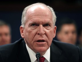 FILE - In this May 23, 2017, file photo, former CIA Director John Brennan testifies on Capitol Hill in Washington, before the House Intelligence Committee Russia Investigation Task Force. President Donald Trump is revoking the security clearance of former Obama administration CIA director Brennan