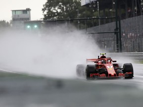 Ferrari driver Kimi Raikkonen of Finland steers his racer during practice at the Monza racetrack, in Monza, Italy , Friday, Aug. 31, 2018. The Formula one race will be held on Sunday.