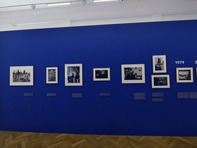 Photographs on display documenting Jewish life in Poland from the 1970s, in Warsaw, Poland, Wednesday, Aug. 8, 2018. A new photo exhibition in Warsaw documents more than 40 years of Jewish life in Poland _ from the 1970s, when it appeared that Jewish life was on the verge of extinction, to an unexpected revival in the years following the fall of communism. The exhibition, "Re-Generation," features dozens of black-and-white images taken by American photographer Chuck Fishman.