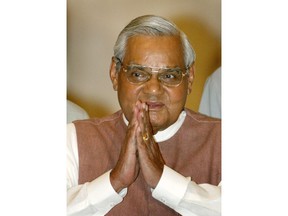 FILE - In this May 2, 2004 file photo, Indian Prime Minister Atal Bihari Vajpayee greets the audience as he arrives for a ceremony at the Presidential Palace in New Delhi, India. Former prime minister Vajpayee, who pursued both nuclear weapons and peace talks with Pakistan, died Thursday, Aug. 16, 2018, at age 93.