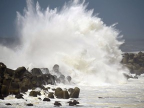 High wave hits a breakwater in Aki city, Kochi prefecture, western Japan as typhoon Cimaron approaches the area.