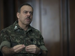 Public Security Secretary of Rio de Janeiro Gen. Richard Nunes speaks during an interview, in Rio de Janeiro, Brazil, Friday, Aug. 31, 2018. The general in charge of security as part of a controversial military intervention in Rio de Janeiro said that a rise in police killings was a sign of successful crime fighting and not that the problems were getting worse, as many critics have argued.