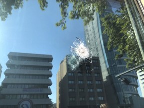 The damage to a security booth by a shot fired, is seen outside the U.S. Embassy in Ankara, Turkey, Monday, Aug. 20, 2018. Shots were fired at a security booth outside the embassy in Turkey's capital early Monday, but U.S. officials said no one was hurt. Ties between Ankara and Washington have been strained over the case of an imprisoned American pastor, leading the U.S. to impose sanctions, and increased tariffs that sent the Turkish lira tumbling last week.